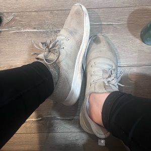 Well worn Adidas running shoes